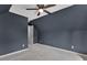 Attic bedroom with vaulted ceilings and a ceiling fan at 2061 Emerald Dr, Loganville, GA 30052