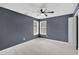 Attic bedroom featuring vaulted ceilings, carpet and a ceiling fan at 2061 Emerald Dr, Loganville, GA 30052