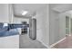 Bright kitchen with stainless steel appliances, plenty of counter space, and tile flooring at 2061 Emerald Dr, Loganville, GA 30052