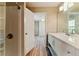 Bright bathroom with tile shower, updated vanity, and modern fixtures; an inviting space at 3267 Forrest Bluff Way, Lithonia, GA 30038