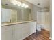 Bathroom with double vanity, granite counters, and tiled shower/tub combo at 3267 Forrest Bluff Way, Lithonia, GA 30038