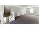 Spacious bonus room with neutral paint, large window, and plush carpet; perfect for entertaining at 3267 Forrest Bluff Way, Lithonia, GA 30038