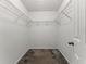 Neat walk-in closet with wire shelving for organized storage at 3267 Forrest Bluff Way, Lithonia, GA 30038