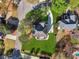 Overhead shot showcasing the home's expansive lawn, landscaping, and curb appeal at 405 N Pine Dr, Alpharetta, GA 30022
