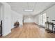The basement has tile flooring, a skylight, French doors leading to the backyard, and a potted plant at 405 N Pine Dr, Alpharetta, GA 30022
