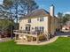 Two story home with a spacious backyard, large deck, and ample lawn space at 405 N Pine Dr, Alpharetta, GA 30022
