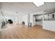 This open-concept floor plan flows from the kitchen to the living room offering an expansive view at 405 N Pine Dr, Alpharetta, GA 30022