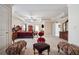Expansive main bedroom featuring ample space, a large bed, sitting area, and plenty of furniture at 405 N Pine Dr, Alpharetta, GA 30022