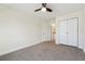 Spacious bedroom features carpet, a closet, and an ensuite bathroom providing comfort and convenience at 7902 West Shore Cir, Riverdale, GA 30296