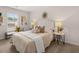 Comfortable bedroom with a stylish bed, soft lighting, and tasteful decor at 1326 Riverstone Rd, Jonesboro, GA 30238