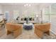 Cozy living room featuring lots of natural light and modern furnishings at 1326 Riverstone Rd, Jonesboro, GA 30238