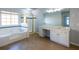 Bathroom featuring a large tub, glass-enclosed shower, tile floor, and double vanity at 2875 Factor Walk Blvd, Suwanee, GA 30024