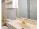 Well-lit bathroom featuring a vanity, toilet, and shower with gold hardware at 2875 Factor Walk Blvd, Suwanee, GA 30024