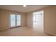 Bedroom features a doorway and a door to the backyard at 2875 Factor Walk Blvd, Suwanee, GA 30024