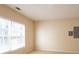 Bedroom with neutral walls, a window and standard lighting at 2875 Factor Walk Blvd, Suwanee, GA 30024