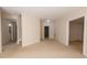 Hallway features neutral colors, and multiple doors at 2875 Factor Walk Blvd, Suwanee, GA 30024
