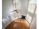 Sunlit living room features high ceilings, a fireplace, and hardwood floors at 2875 Factor Walk Blvd, Suwanee, GA 30024