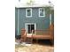 View of the home's back deck that has stairs leading to the yard and a sliding glass door entry at 3516 Ashley Station Sw Dr, Marietta, GA 30008