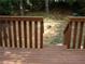 Backyard featuring stairs leading to a lower level with natural greenery around at 3516 Ashley Station Sw Dr, Marietta, GA 30008