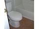 Toilet and tub/shower combo with tile flooring in bathroom at 3516 Ashley Station Sw Dr, Marietta, GA 30008