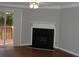Fireplace and sliding glass doors leading to a wooden deck at 3516 Ashley Station Sw Dr, Marietta, GA 30008