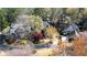 Neighborhood aerial showcasing lush trees and well-maintained homes, highlighting the community's serene environment and curb appeal at 4045 Stephens Mill Ne Run, Atlanta, GA 30342