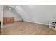 Spacious bonus room with sloped ceilings and hardwood floors, perfect for recreation or hobbies at 4045 Stephens Mill Ne Run, Atlanta, GA 30342