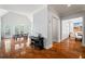 Open-concept dining area with vaulted ceilings, hardwood floors, and access to outdoor views at 4045 Stephens Mill Ne Run, Atlanta, GA 30342