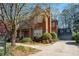Lovely brick home with an inviting driveway and landscaped front yard, enhancing its curb appeal and welcoming feel at 4045 Stephens Mill Ne Run, Atlanta, GA 30342