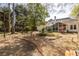 Expansive backyard featuring mature trees and potential for outdoor enjoyment and landscaping at 1864 Crestridge Ne Pl, Atlanta, GA 30345