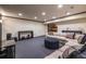 Finished basement with plush carpet, ample seating, and modern finishes at 1864 Crestridge Ne Pl, Atlanta, GA 30345