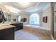 Elegant bathroom boasting a deep soaking tub, a walk-in shower, and a double vanity with granite counters at 1864 Crestridge Ne Pl, Atlanta, GA 30345