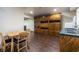 Charming dining area with built in cabinets and sink adjacent to an updated kitchen space at 1864 Crestridge Ne Pl, Atlanta, GA 30345