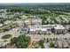 An aerial view of the neighborhood showing buildings and green spaces at 2068 Cortland Rd, Milton, GA 30009