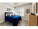 Cozy bedroom with a neutral palette, bright window, and carpeted floors at 2068 Cortland Rd, Milton, GA 30009