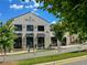 Exterior shot of modern commercial building with awnings and large windows at 2068 Cortland Rd, Milton, GA 30009