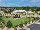 Exterior shot of community green space with event stage, and green landscaping at 2068 Cortland Rd, Milton, GA 30009
