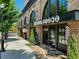 Close exterior shot of a Reesha Barbershop storefront with decorative barber pole at 2068 Cortland Rd, Milton, GA 30009