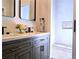 Elegant bathroom vanity with double sinks, a white countertop, and black hardware accents at 2152 Castlewood St, East Point, GA 30344