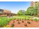 A well-maintained courtyard with a gazebo, flowers, and lush green space for a relaxing outdoor environment at 300 Johnson Ferry Ne Rd # A1008, Atlanta, GA 30328