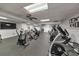 A fully-equipped fitness center with cardio machines and motivational wall art for residents to stay active at 300 Johnson Ferry Ne Rd # A1008, Atlanta, GA 30328