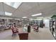 A cozy library with rows of bookshelves and comfortable seating for reading and relaxation at 300 Johnson Ferry Ne Rd # A1008, Atlanta, GA 30328