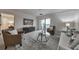 An inviting living room with a modern rug, stylish furniture, and balcony access at 300 Johnson Ferry Ne Rd # A1008, Atlanta, GA 30328