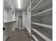 Spacious walk-in closet with ample shelving and storage options at 300 Johnson Ferry Ne Rd # A1008, Atlanta, GA 30328