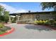 View of community cafe with beautiful landscaping and modern architecture at 8 Arpege Nw Way, Atlanta, GA 30327