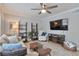 Comfortable living room featuring modern decor, ceiling fan, and ample seating at 8 Arpege Nw Way, Atlanta, GA 30327