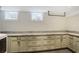 Spacious basement area with modern gray cabinets and countertops at 219 Little John Ne Trl, Atlanta, GA 30309