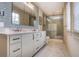 Bright bathroom with double vanity, walk-in shower, and modern finishes at 219 Little John Ne Trl, Atlanta, GA 30309
