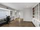 Bright home office featuring built-in bookshelves and desk space by the window at 219 Little John Ne Trl, Atlanta, GA 30309