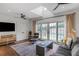 Living room with hardwood floors, ample natural light, and views of the pool at 219 Little John Ne Trl, Atlanta, GA 30309